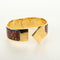 Hermès Zatrzask - metalowa bransoletka bangle z nadrukowaną emalią 58 Facettes q8b78hsd8k