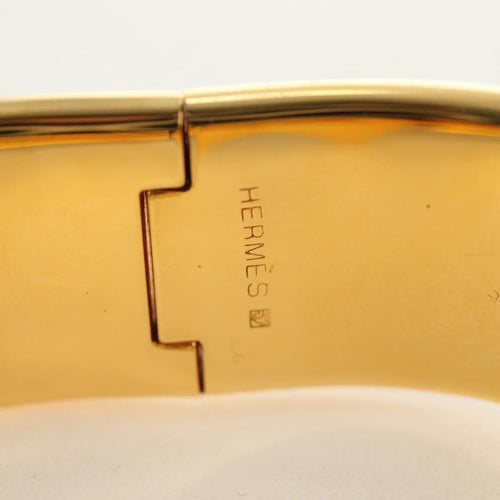 Hermès Zatrzask - metalowa bransoletka bangle z nadrukowaną emalią 58 Facettes q8b78hsd8k
