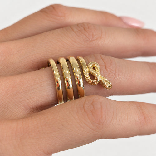 https://18carats.fr/wp-content/uploads/2026/06/37628-37934-Bague-serpent-en-or-jaune.jpg