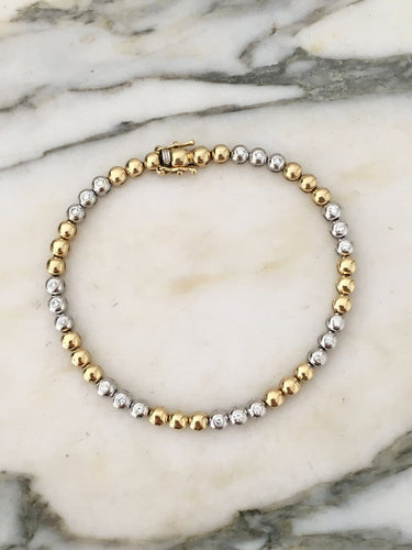Bracelet Bracelet en or jaune et or blanc 18K et diamants 58 Facettes 280