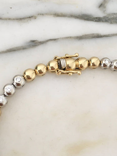 Bracelet Bracelet en or jaune et or blanc 18K et diamants 58 Facettes 280