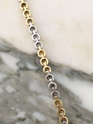 Bracelet Bracelet en or jaune et or blanc 18K et diamants 58 Facettes 280