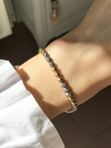 Bracelet Bracelet en or jaune et or blanc 18K et diamants 58 Facettes 280