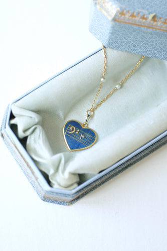 Collier Collier pendentif cœur clé de fa en or jaune, perle et diamant 58 Facettes