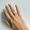 https://cdn.shopify.com/s/files/1/0943/8576/6747/files/bague-diamante solitario-diamant-or-blanc.webp?v=1789634689