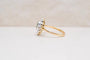 https://cdn.shopify.com/s/files/1/0963/7950/2920/files/bague-ancienne-Stokrotka-emeraude-diamants.jpg?v=1789547993