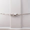 Collier Collier 4 cœurs en or blanc et diamants 58 Facettes 26383