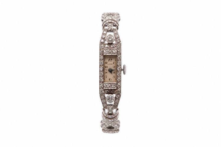 Montre Montre Art déco en platine sertie de diamants 58 Facettes 26087