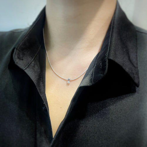 Collier Collier pendentif en or blanc et diamant 58 Facettes 230035SP