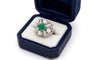 Ring 53 Ring with central emerald in platinum and diamonds 58 Facettes 562/26 A