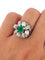 Ring 53 Ring with central emerald in platinum and diamonds 58 Facettes 562/26 A
