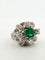 Ring 53 Ring with central emerald in platinum and diamonds 58 Facettes 562/26 A