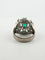 Ring 53 Ring with central emerald in platinum and diamonds 58 Facettes 562/26 A