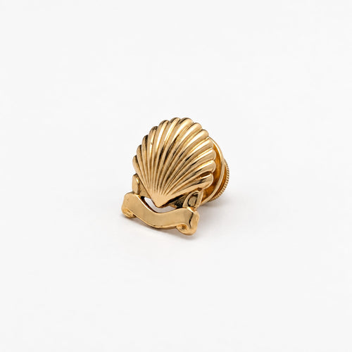 https://18carats.fr/wp-content/uploads/2026/09/38007-38451-Cartier-–-Broche-coquillage-en-or-jaune.jpg