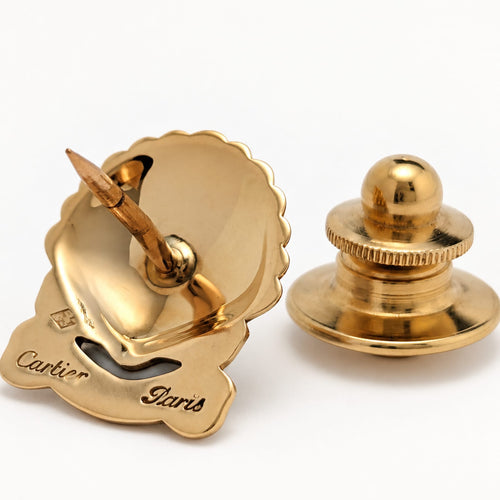 https://18carats.fr/wp-content/uploads/2026/09/38007-38453-Cartier-–-Broche-coquillage-en-or-jaune.jpg