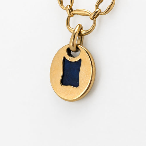 https://18carats.fr/wp-content/uploads/2026/07/38029-38416-Collier-Cartier-en-or-jaune-et-lapis-lazuli.jpg
