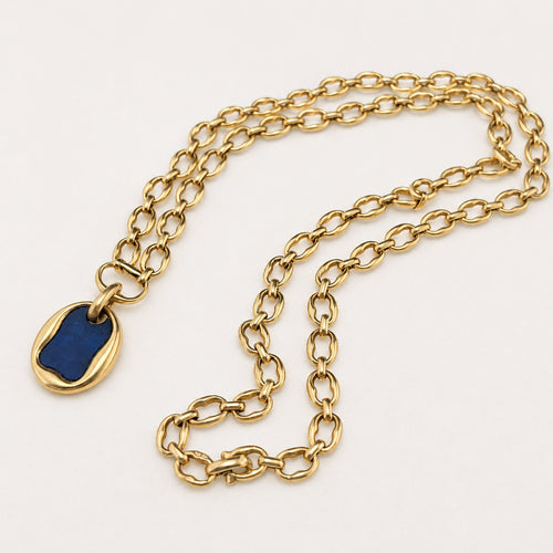 https://18carats.fr/wp-content/uploads/2026/07/38029-38410-Collier-Cartier-en-or-jaune-et-lapis-lazuli.jpg