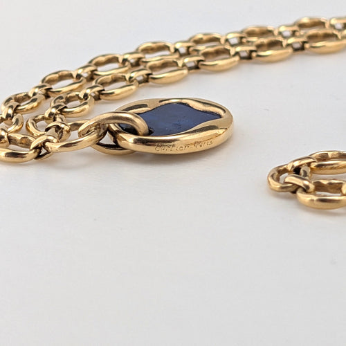 https://18carats.fr/wp-content/uploads/2026/07/38029-38418-Collier-Cartier-en-or-jaune-et-lapis-lazuli-scaled.jpg