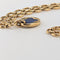 https://18carats.fr/wp-content/uploads/2026/07/38029-38418-Collier-Cartier-en-or-jaune-et-lapis-lazuli-scaled.jpg