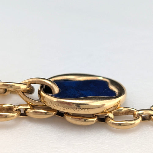 https://18carats.fr/wp-content/uploads/2026/07/38029-38420-Collier-Cartier-en-or-jaune-et-lapis-lazuli-scaled.jpg