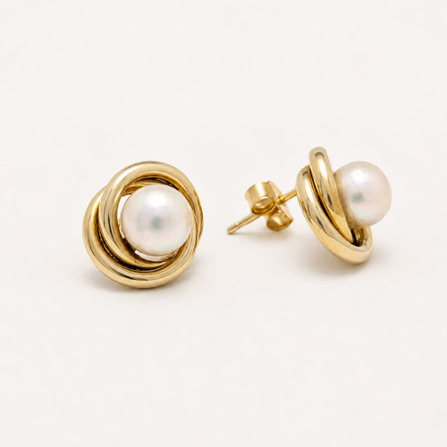 https://18carats.fr/wp-content/uploads/2026/07/38005-38352-Boucles-doreilles-en-or-jaune-et-perle.jpg