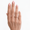 https://18carats.fr/wp-content/uploads/2026/09/37902-38320-Bague-torsadee-trois-ors-CARTIER.png