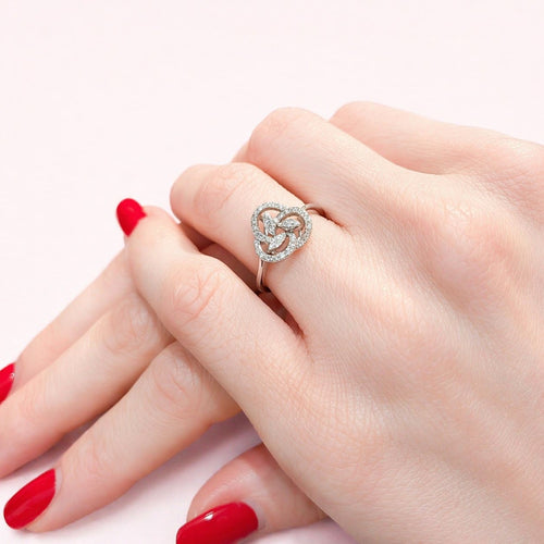 https://18carats.fr/wp-content/uploads/2026/01/33734-36112-Bague-en-or-blanc-et-diamants.jpg