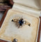 Bague 51 Bague marguerite en or jaune, saphir et diamants 58 Facettes 758