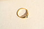 https://cdn.shopify.com/s/files/1/0963/7950/2920/files/bague-jonc-anglais-en-or-jaune-ornee-d-un-saphir-epaule-de-deux-diamants-bague-femme.jpg?v=1790081039