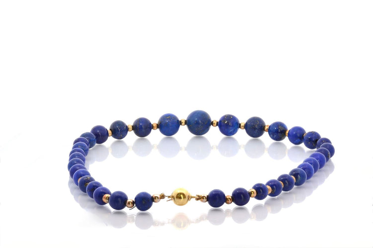 Collier Collier de perles en lapis-lazuli en or 18 carats 58 Facettes 26997
