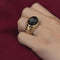 https://ledial.it/app/uploads/2025/04/36427-anello-oro-granato-pomellato-iceberg-indossato_sito.jpg