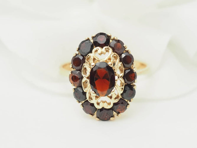 https://cdn.shopify.com/s/files/1/0750/3799/9372/files/laurore-bague-vintage-or-jaune-grenats.jpg?v=1790867286