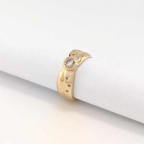 https://18carats.fr/wp-content/uploads/2026/08/38080-38570-Bague-en-or-jaune-et-diamant.jpg