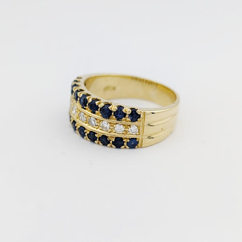 https://18carats.fr/wp-content/uploads/2025/12/33775-34398-Bague-en-or-jaune-diamants-et-saphirs.jpg