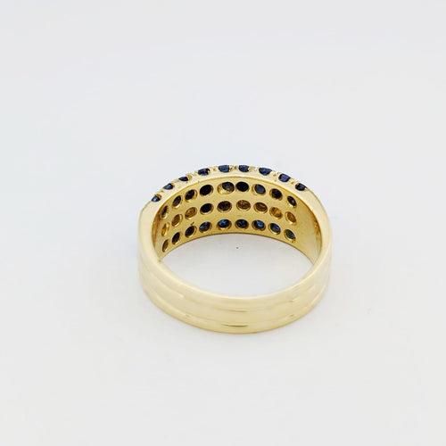 https://18carats.fr/wp-content/uploads/2025/12/33775-34399-Bague-en-or-jaune-diamants-et-saphirs.jpg