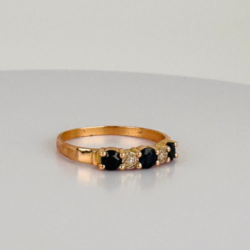 https://cdn.shopify.com/s/files/1/0829/5212/6812/files/Vintage_14K_Rose_Gold_Blue_Sapphire_Diamond_Ring_1.jpg?v=1791294407