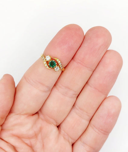 Bague 51 Bague tourbillon ancienne en or 18k, émeraude et diamants 58 Facettes A07900