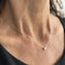 https://ledial.it/app/uploads/2025/07/425-collana-oro-punto-luce-indossato_sito.jpg