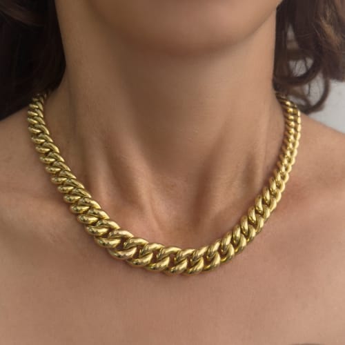 https://ledial.it/app/uploads/2025/07/37423-collana-oro-groumette-indossato_sito.jpg