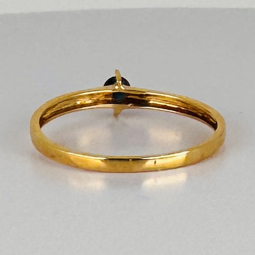 https://cdn.shopify.com/s/files/1/0829/5212/6812/files/14K_Yellow_Gold_Blue_Sapphire_Ring_4.jpg?v=1791537049