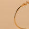 https://cdn.shopify.com/s/files/1/0940/1971/5447/files/bracelet-cartier-or-luxe-marque.jpg?v=1789385549