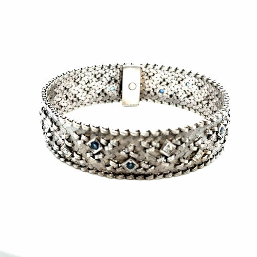 https://cdn.shopify.com/s/files/1/0940/1971/5447/files/bracelet-or-blanc-diamant-saphir-occasion-luxe.jpg?v=1762941538