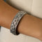 https://cdn.shopify.com/s/files/1/0940/1971/5447/files/bracelet-or-blanc-diamant-saphir-occasion-luxe.jpg?v=1762941538