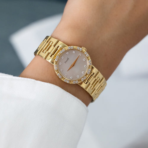 https://cdn.shopify.com/s/files/1/0940/1971/5447/files/montre-piaget-dancer-or-diamants.jpg?v=1790111268