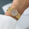 https://cdn.shopify.com/s/files/1/0940/1971/5447/files/montre-piaget-dancer-or-diamants.jpg?v=1790111268