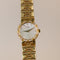 https://cdn.shopify.com/s/files/1/0940/1971/5447/files/montre-piaget-dancer-or-diamants-nacre-cadran.jpg?v=1790111350