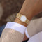 https://cdn.shopify.com/s/files/1/0940/1971/5447/files/montre-piaget-dancer-or-vintage.jpg?v=1790111297