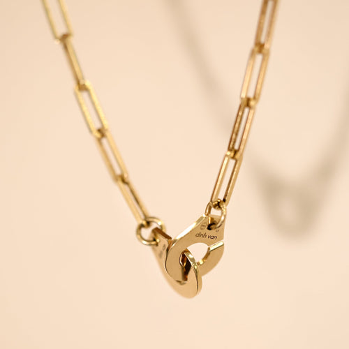 https://cdn.shopify.com/s/files/1/0940/1971/5447/files/dinh-van-menottes-collier.jpg?v=1789073913
