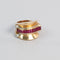 https://cdn.shopify.com/s/files/1/0940/1971/5447/files/bague-tank-rubis-diamants-portee-gros-plan.jpg?v=1791565084