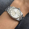 Montre Rolex Oyster Perpetual - Montre en acier, lunette cannelée en or blanc 58 Facettes 36869